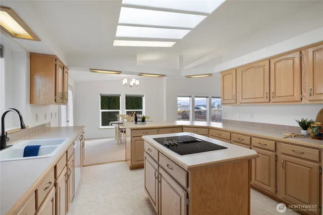 a kitchen with white cabinets