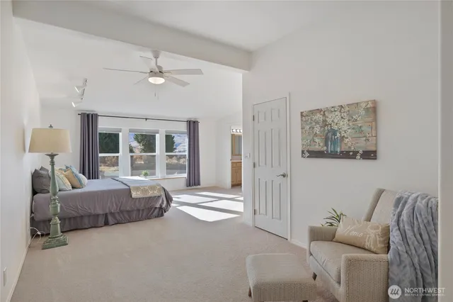 a bedroom with a bed and a cabinets