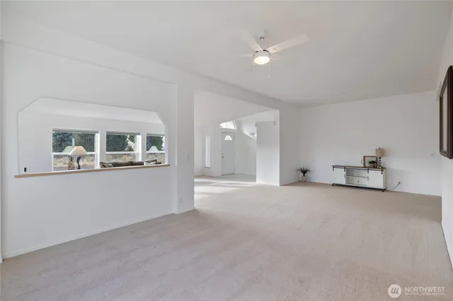 a view of an empty room with cabinet