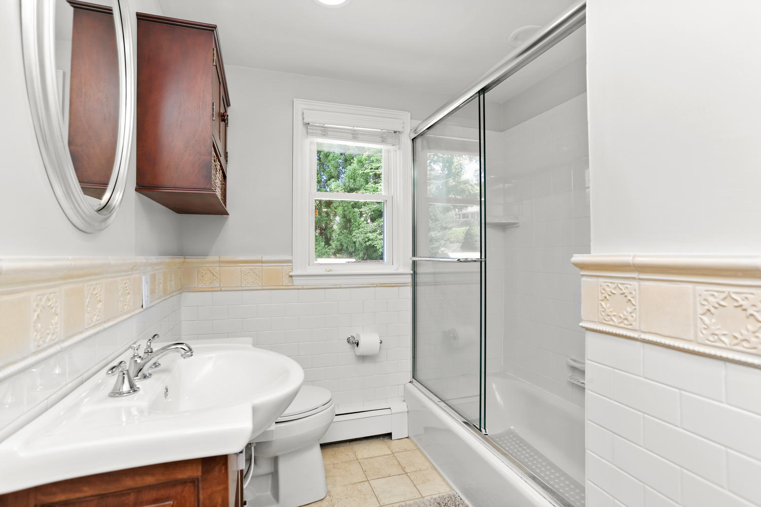 12 Powder Horn Road Norwalk, CT 06850 - Photo 14 of 24 a bathroom with a sink toilet and shower