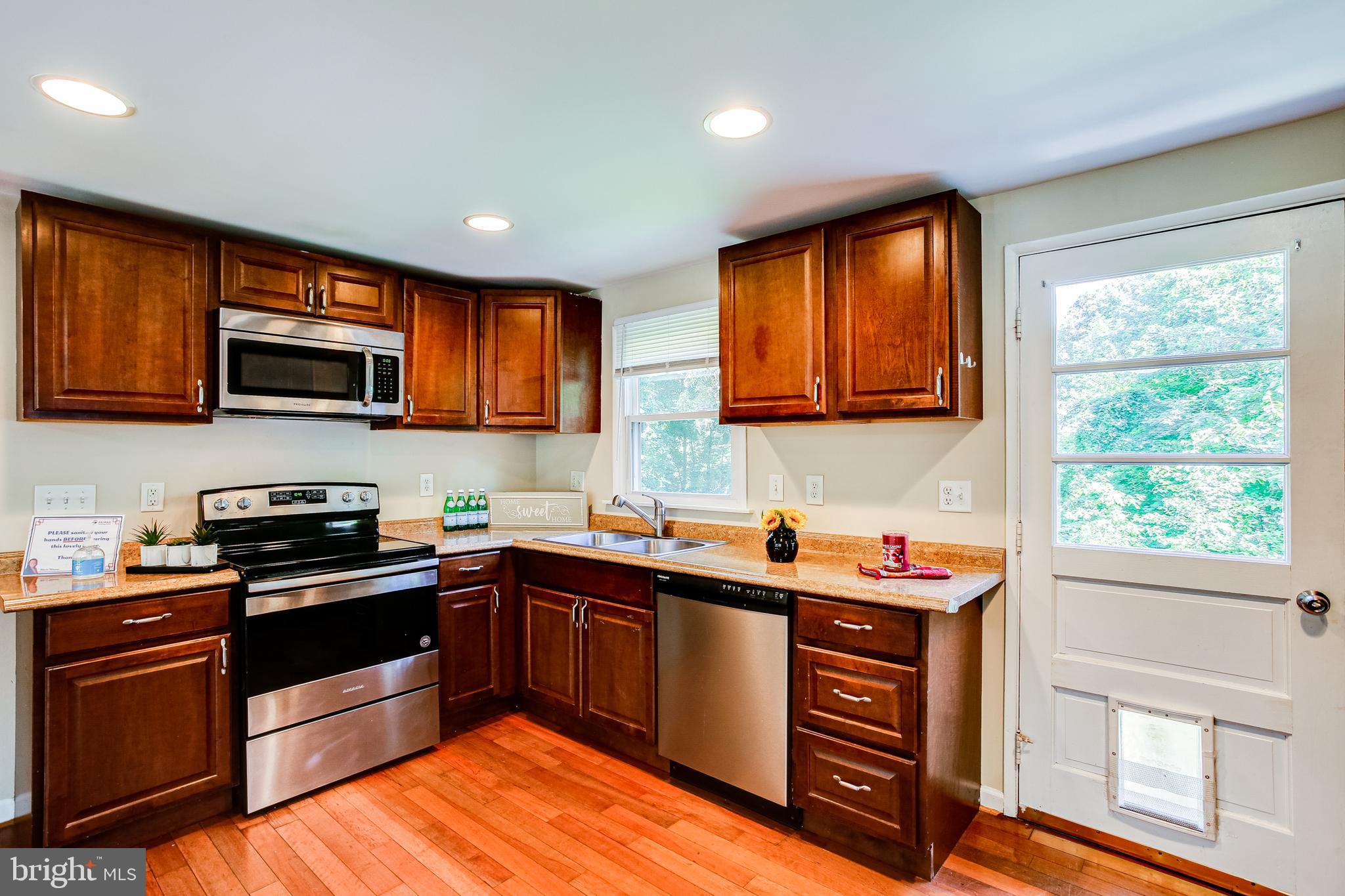 774 Queenstown Road Severn, MD 21144 - Photo 3 of 25 Real hardwood floors in kit, hall, & 3 bedrooms