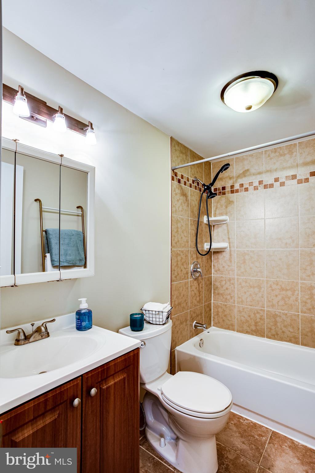 774 Queenstown Road Severn, MD 21144 - Photo 8 of 25 Cherry cabinets and ceramic tile floors