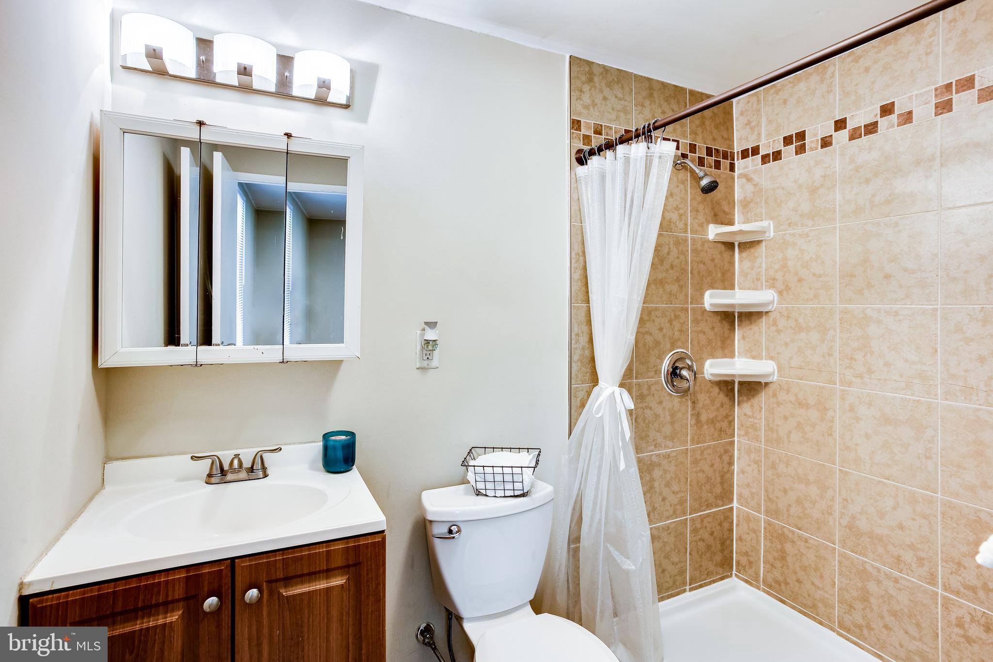 774 Queenstown Road Severn, MD 21144 - Photo 9 of 25 Ceramic tile floors and shower