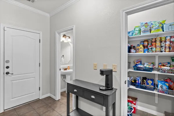a kitchen with a stove and a microwave