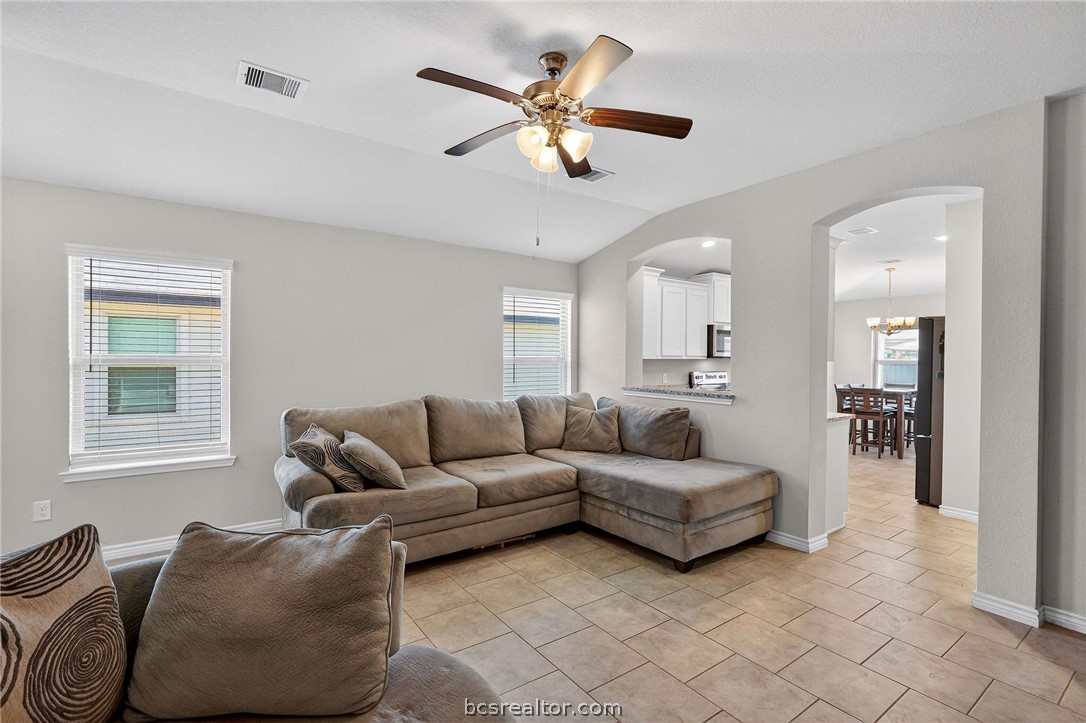 5235 Montague Loop Bryan, TX 77807 - Photo 4 of 25 a living room with furniture and a large window