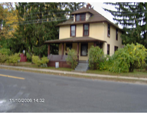 666 Newbury Street Springfield, MA 01104 - Photo 1 of 2 a view of a house with a street