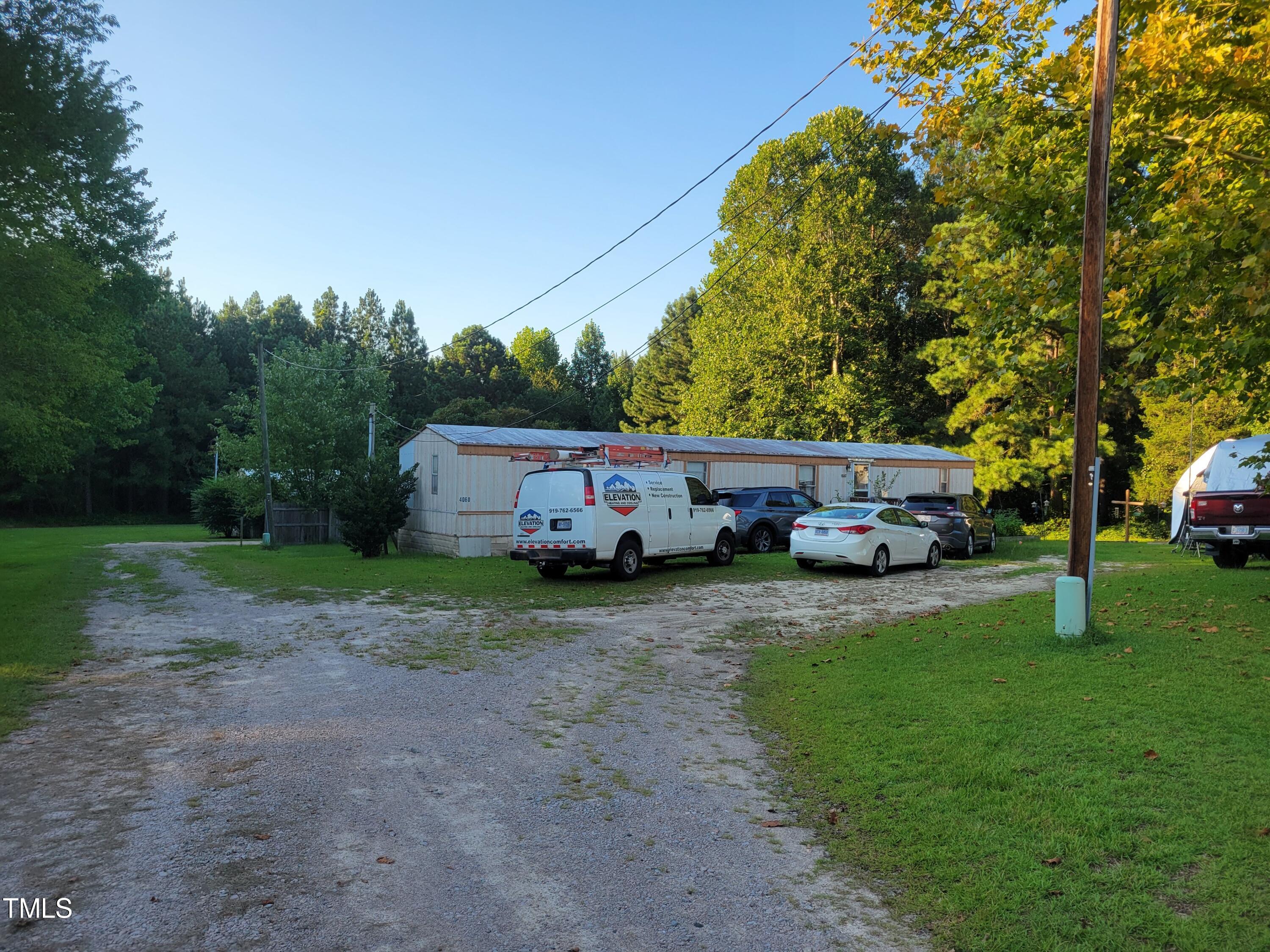 4044 Chris Cole Road Sanford, NC 27332 - Photo 9 of 16 a house view with a garden space