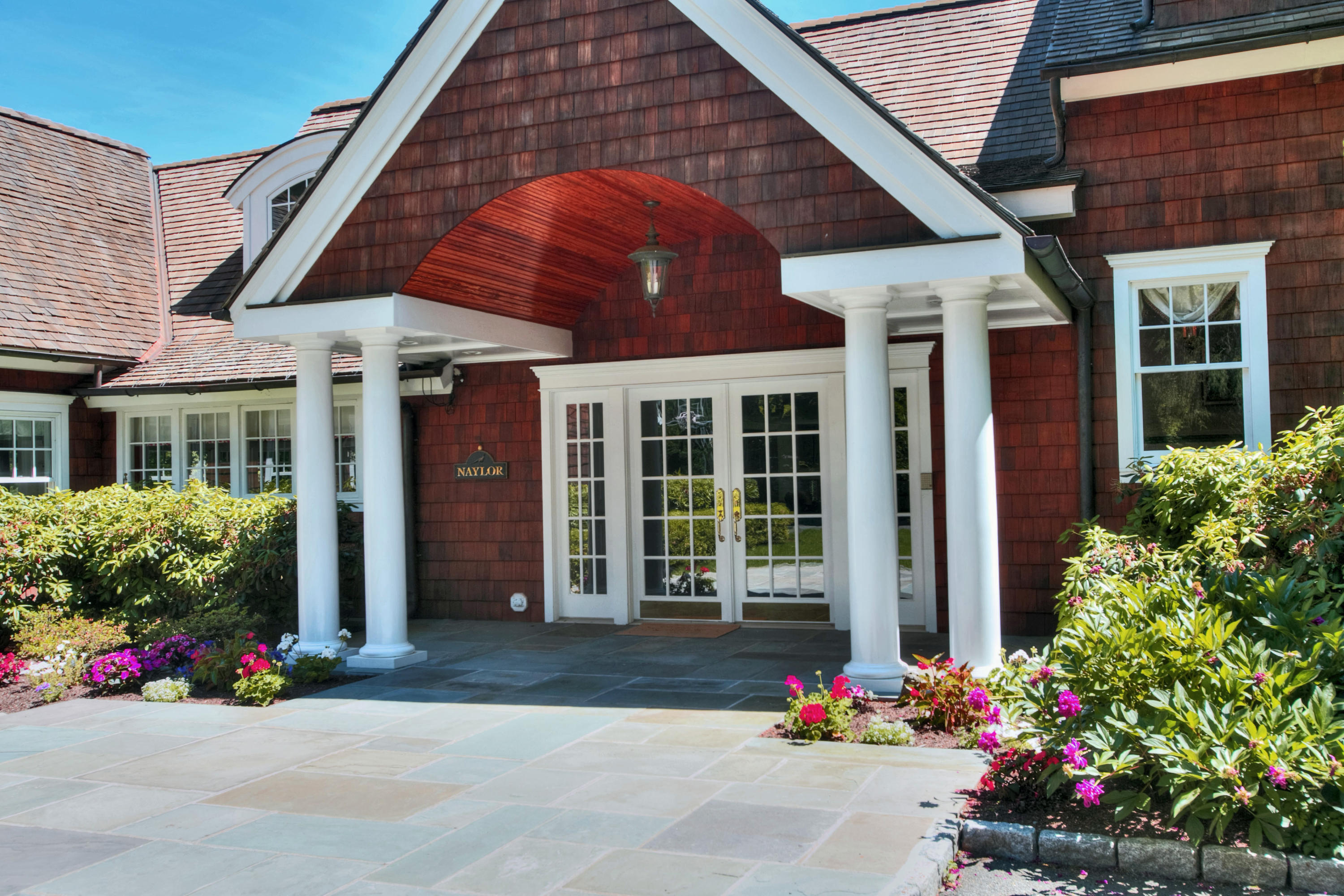 783 Valley Road New Canaan, CT 06840 - Photo 2 of 28 a front view of a house