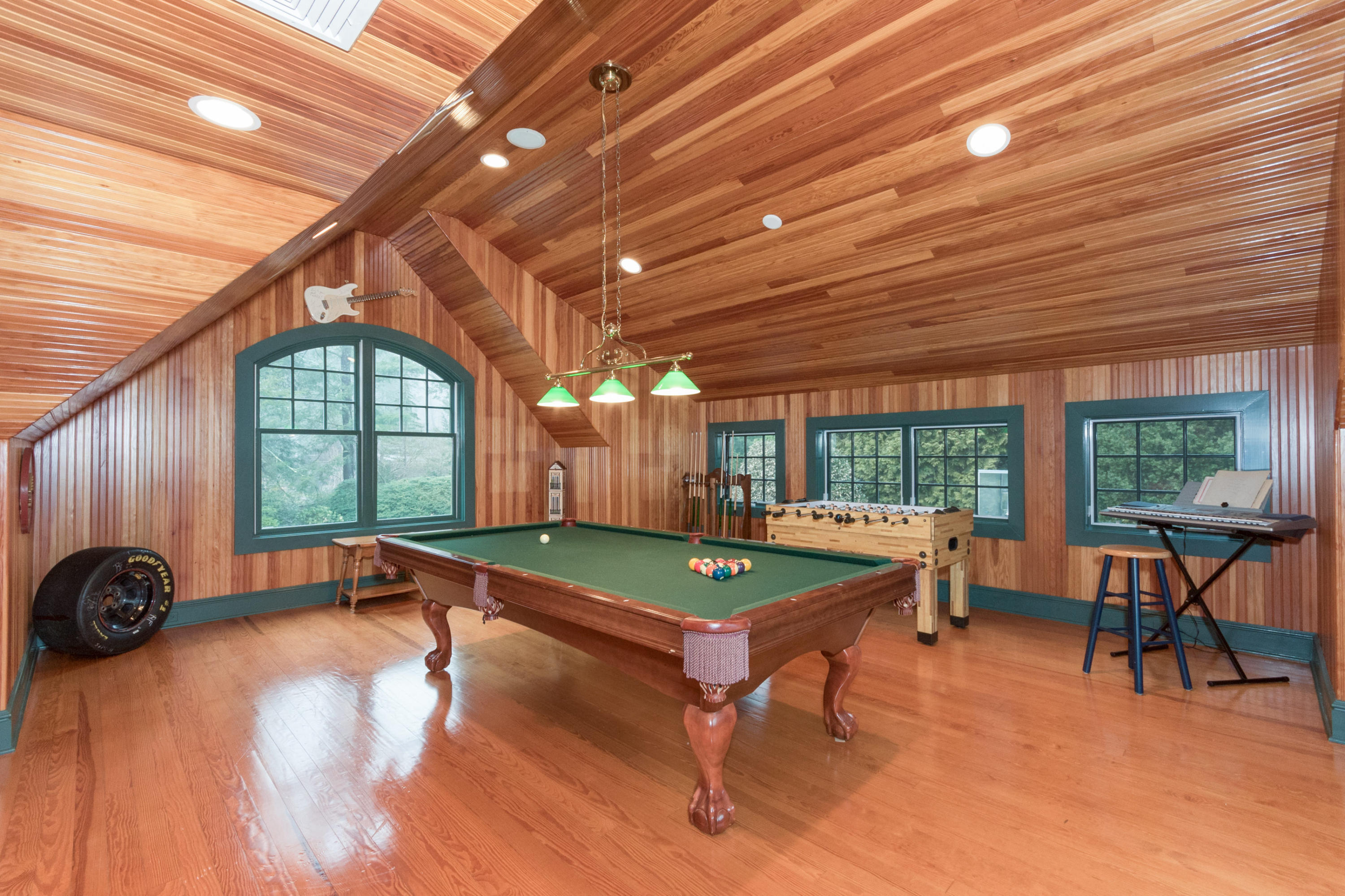 783 Valley Road New Canaan, CT 06840 - Photo 23 of 28 a room with lots of furniture and a large window