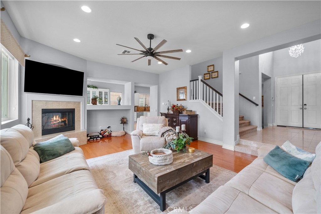29350 Las Brisas Road Valencia, CA 91354 - Photo 12 of 75 a living room with furniture fireplace and a flat screen tv