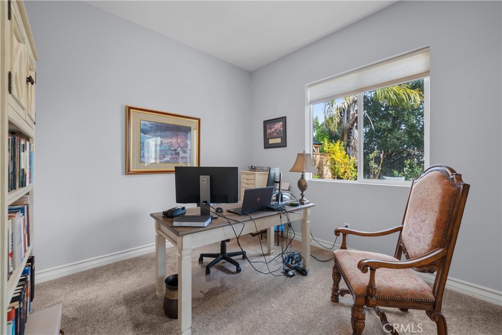 29350 Las Brisas Road Valencia, CA 91354 - Photo 21 of 75 a view of a workspace with furniture and a window