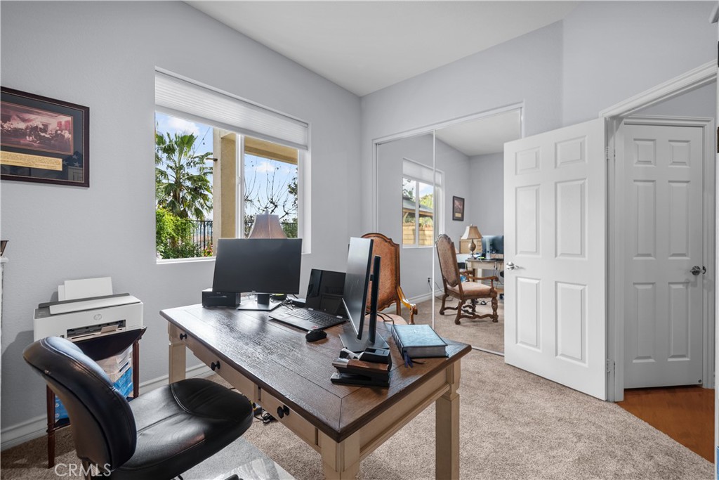 29350 Las Brisas Road Valencia, CA 91354 - Photo 22 of 75 a view of a workspace with furniture and a window