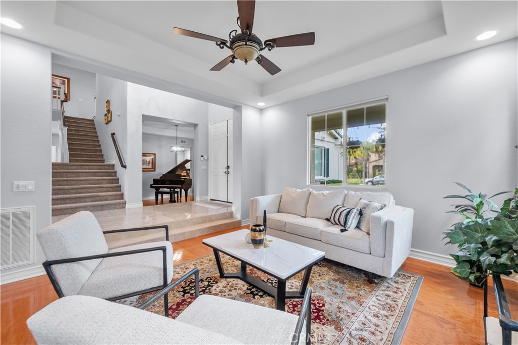 29350 Las Brisas Road Valencia, CA 91354 - Photo 6 of 75 a living room with furniture potted plant and a table