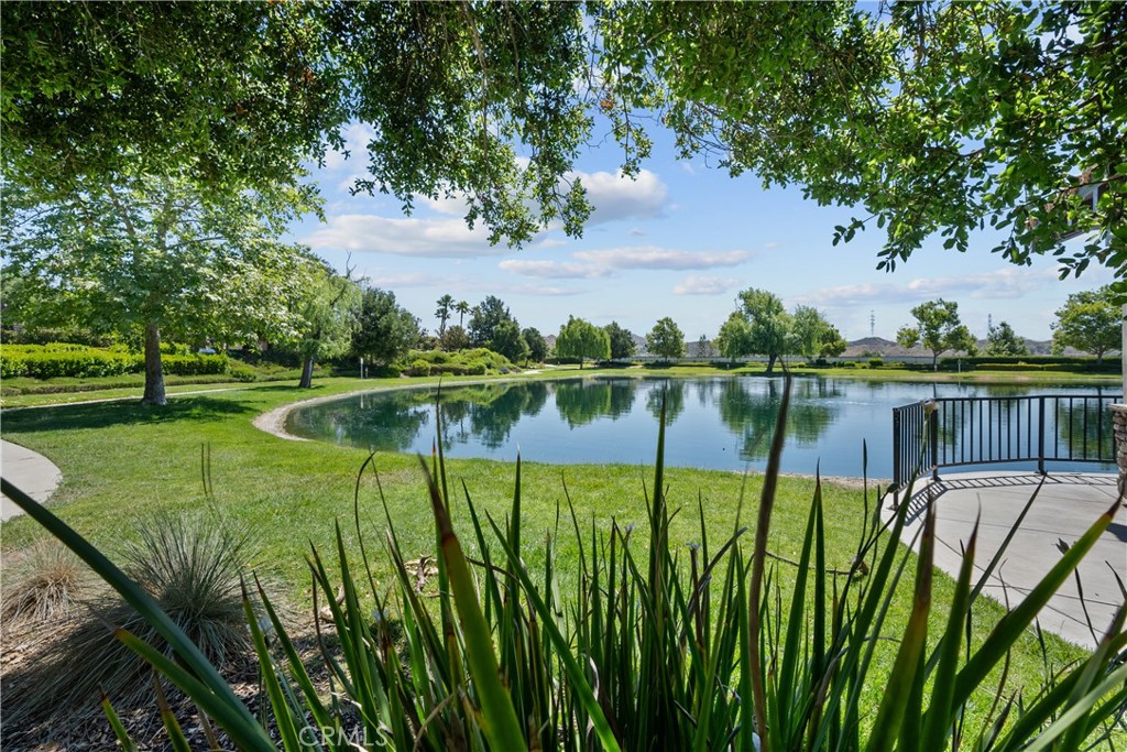 29350 Las Brisas Road Valencia, CA 91354 - Photo 74 of 75 a view of a lake with a house in the background