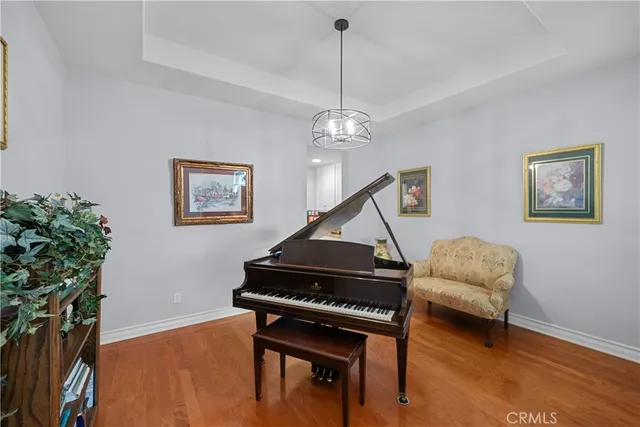 a living room with furniture fireplace and a flat screen tv