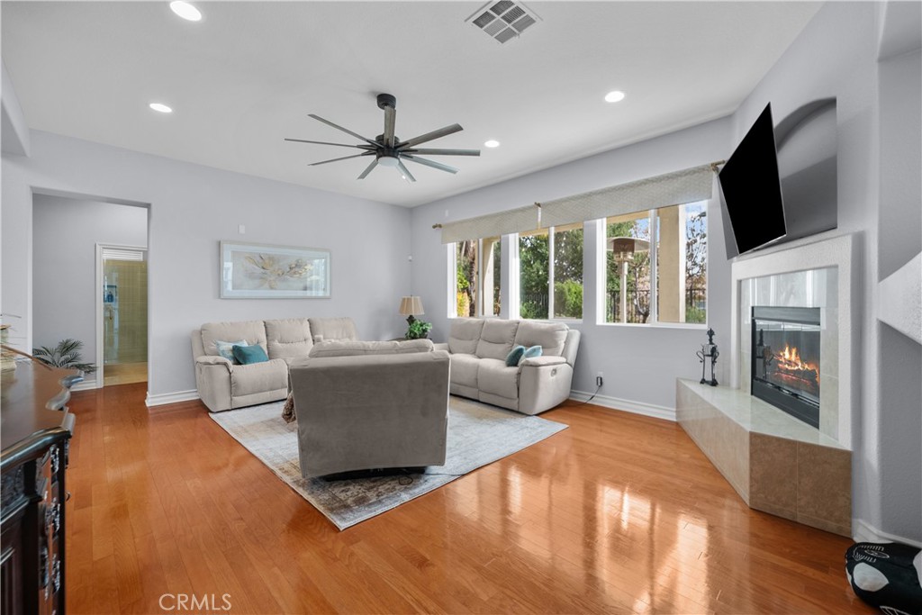 29350 Las Brisas Road Valencia, CA 91354 - Photo 10 of 75 a living room with furniture fireplace and a flat screen tv