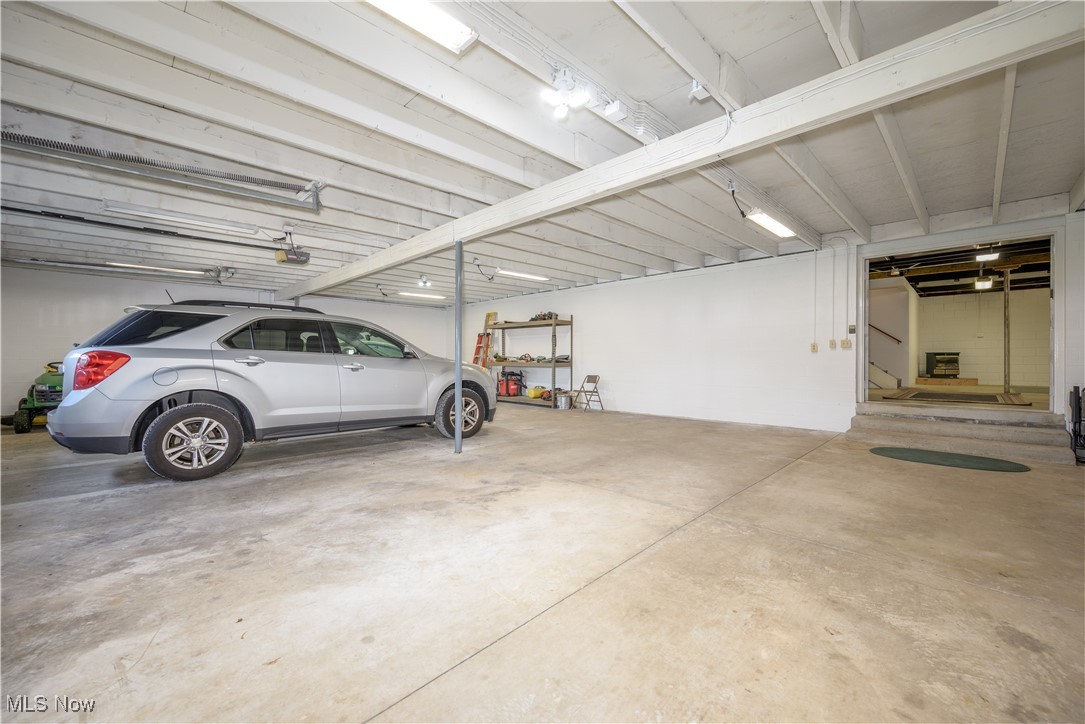 685 West Comet Road Clinton, OH 44216 - Photo 24 of 47 Garage with a garage door opener