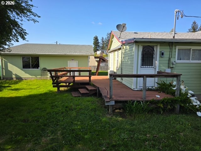 812 B Street Myrtle Point, OR 97458 - Photo 5 of 5 a front view of a house with garden