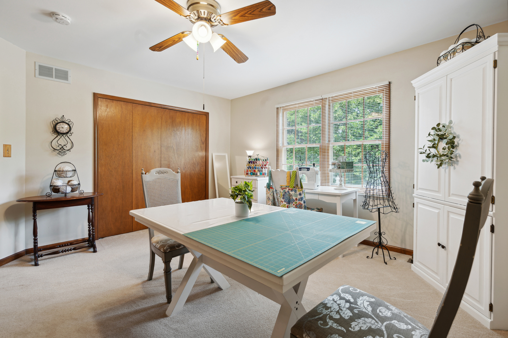 766 Raintree Drive Naperville, IL 60540 - Photo 14 of 30 a view of a dining room with furniture window and wooden floor