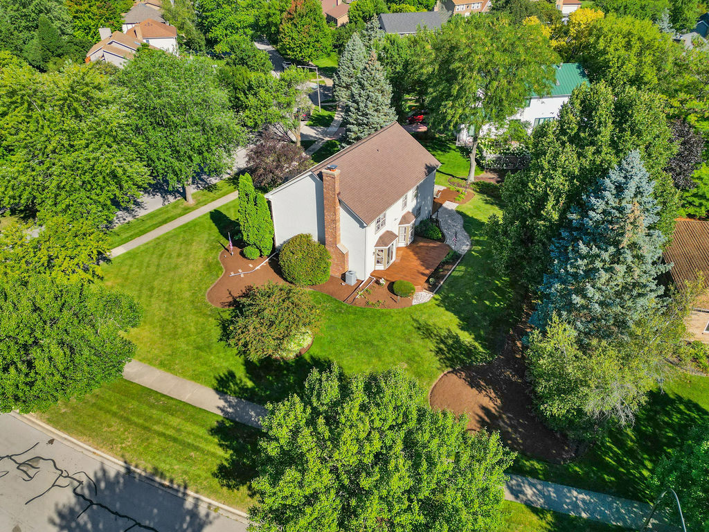 766 Raintree Drive Naperville, IL 60540 - Photo 3 of 30 an aerial view of a house with a yard basket ball court and outdoor seating