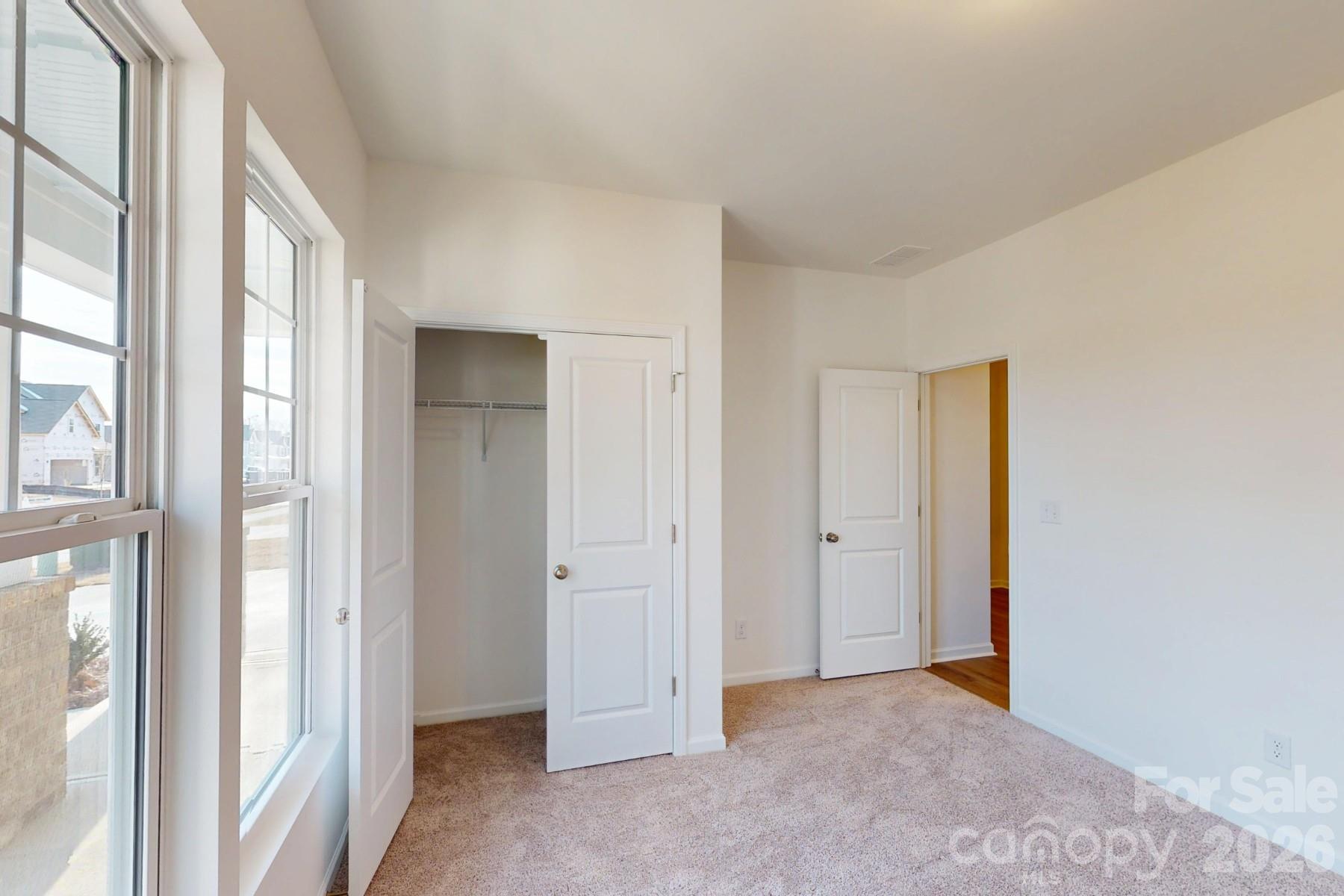 929 Barker Street Monroe, NC 28112 - Photo 18 of 26 a view of an empty room with window