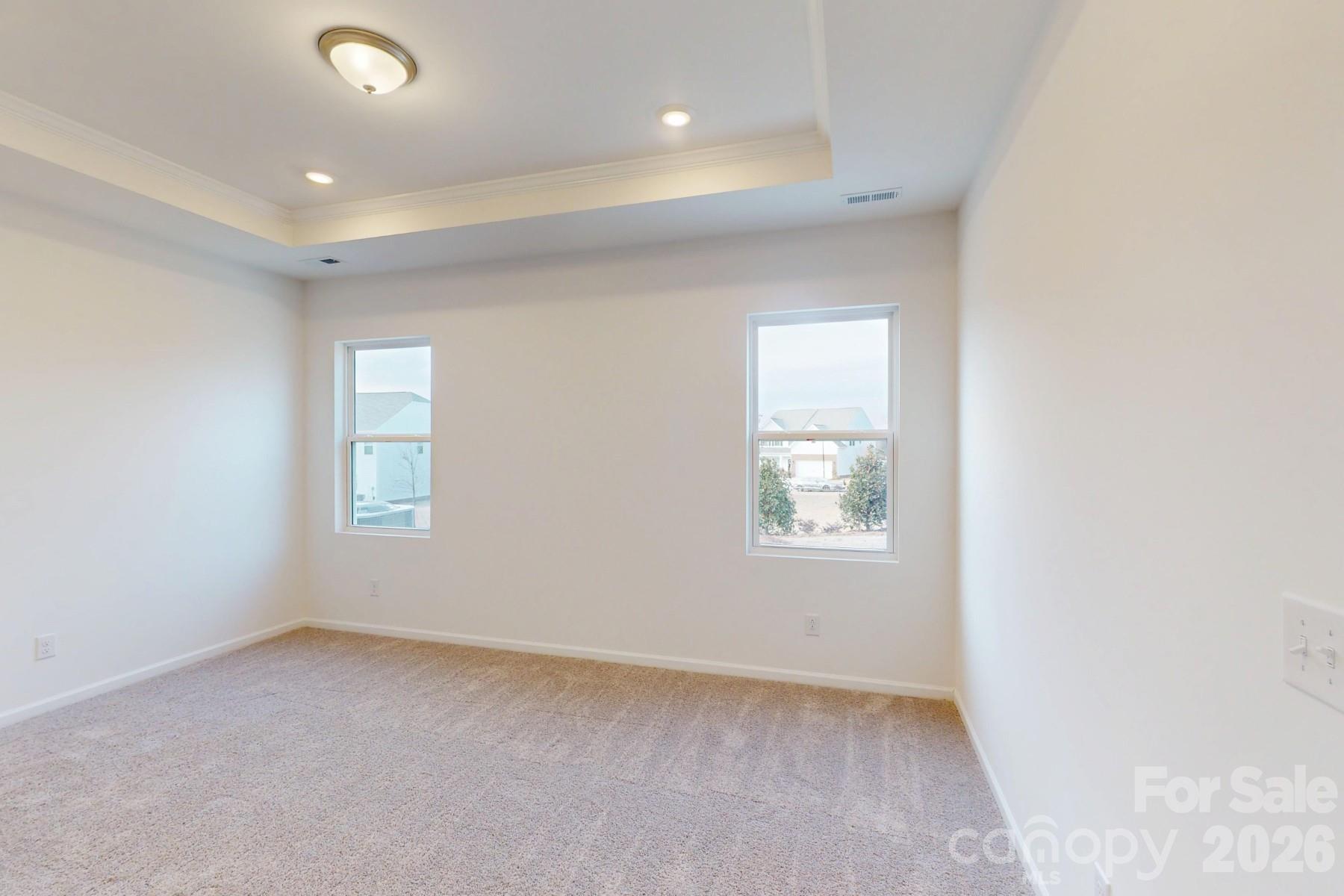 929 Barker Street Monroe, NC 28112 - Photo 20 of 26 an empty room with windows