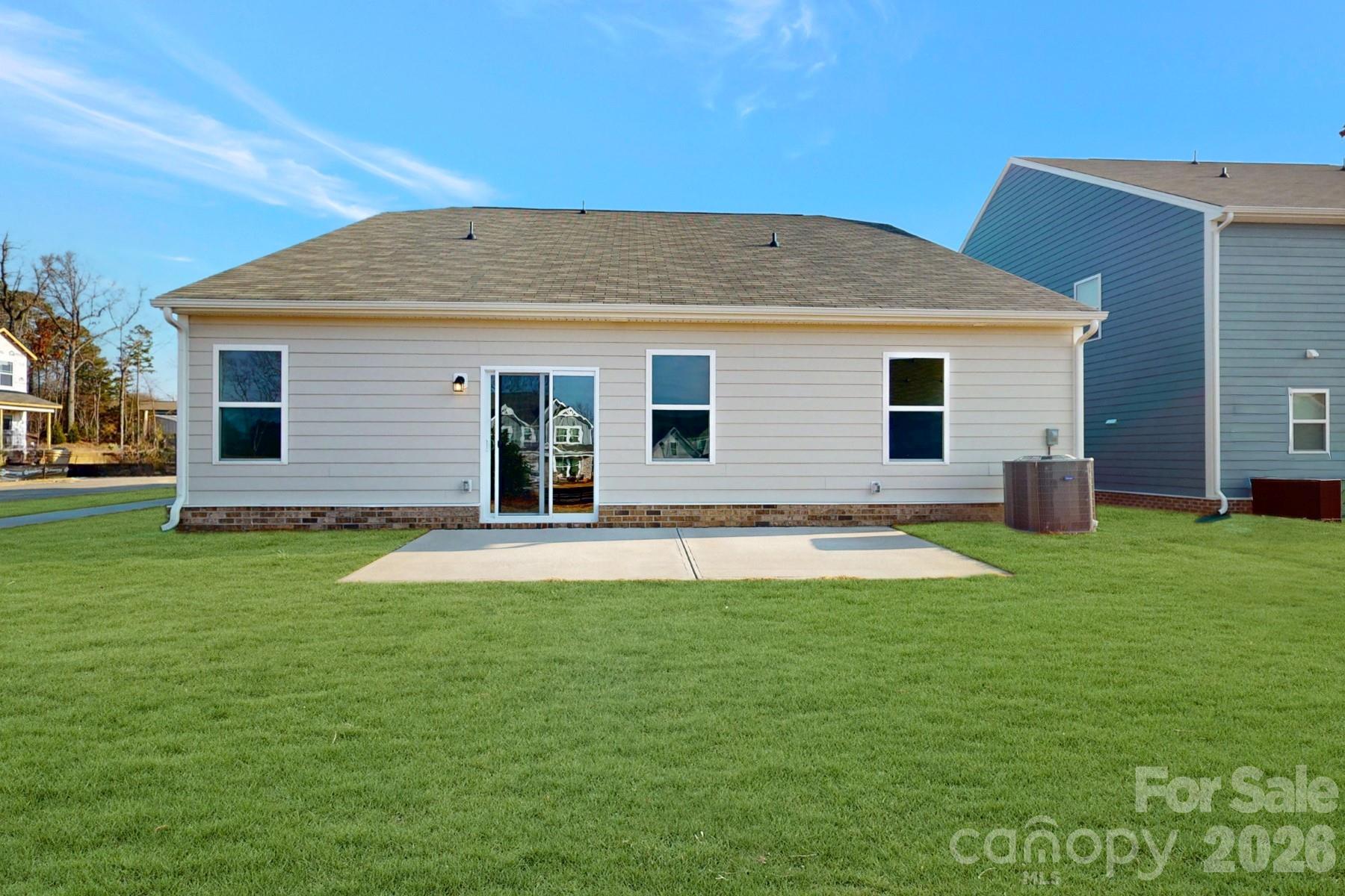 929 Barker Street Monroe, NC 28112 - Photo 2 of 26 a backyard of a house with wooden floor and fence