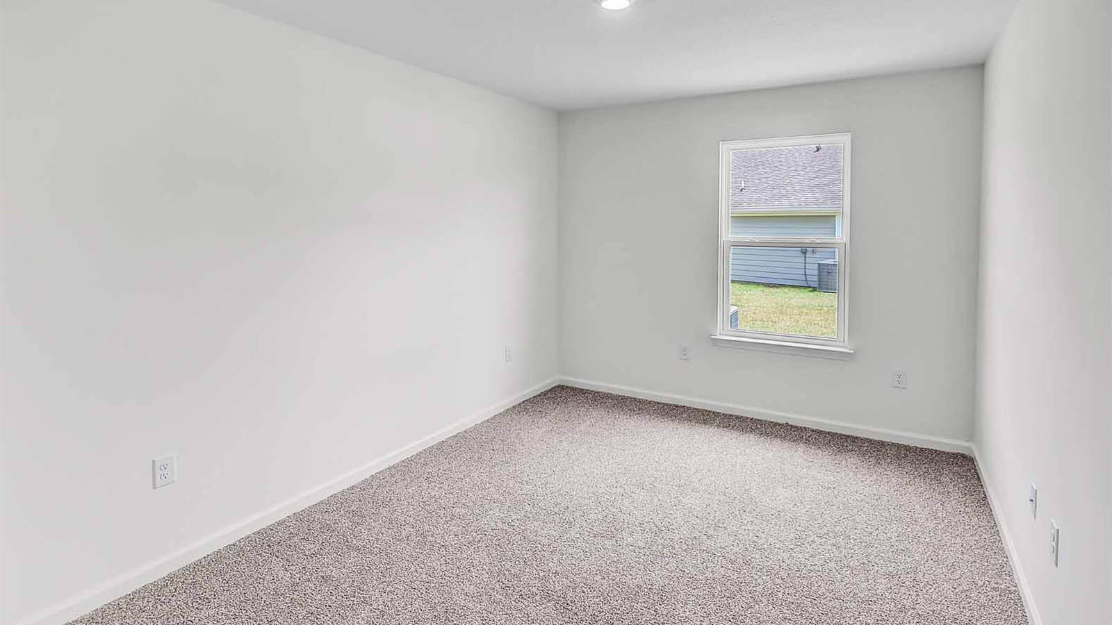 219 Gray Owl Drive Freeport, FL 32439 - Photo 17 of 22 an empty room with a window