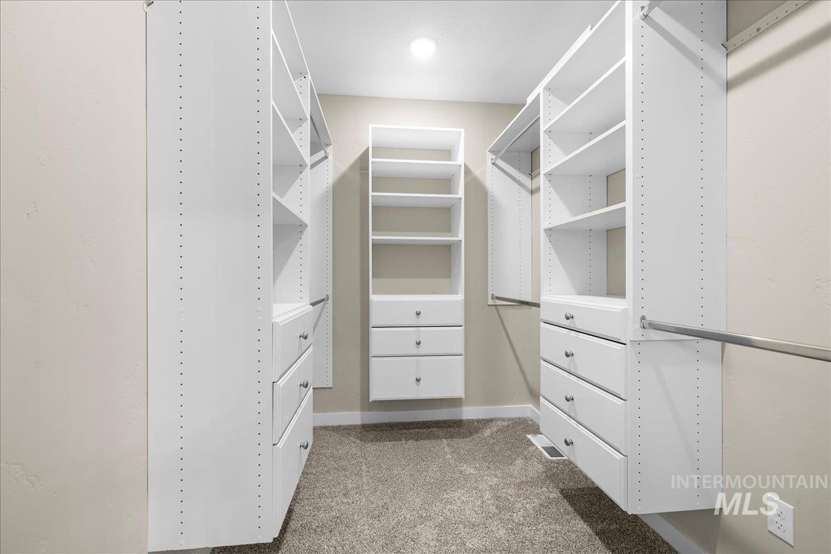 914 West 3rd Street Weiser, ID 83672 - Photo 29 of 49 Walk in closet featuring dark carpet