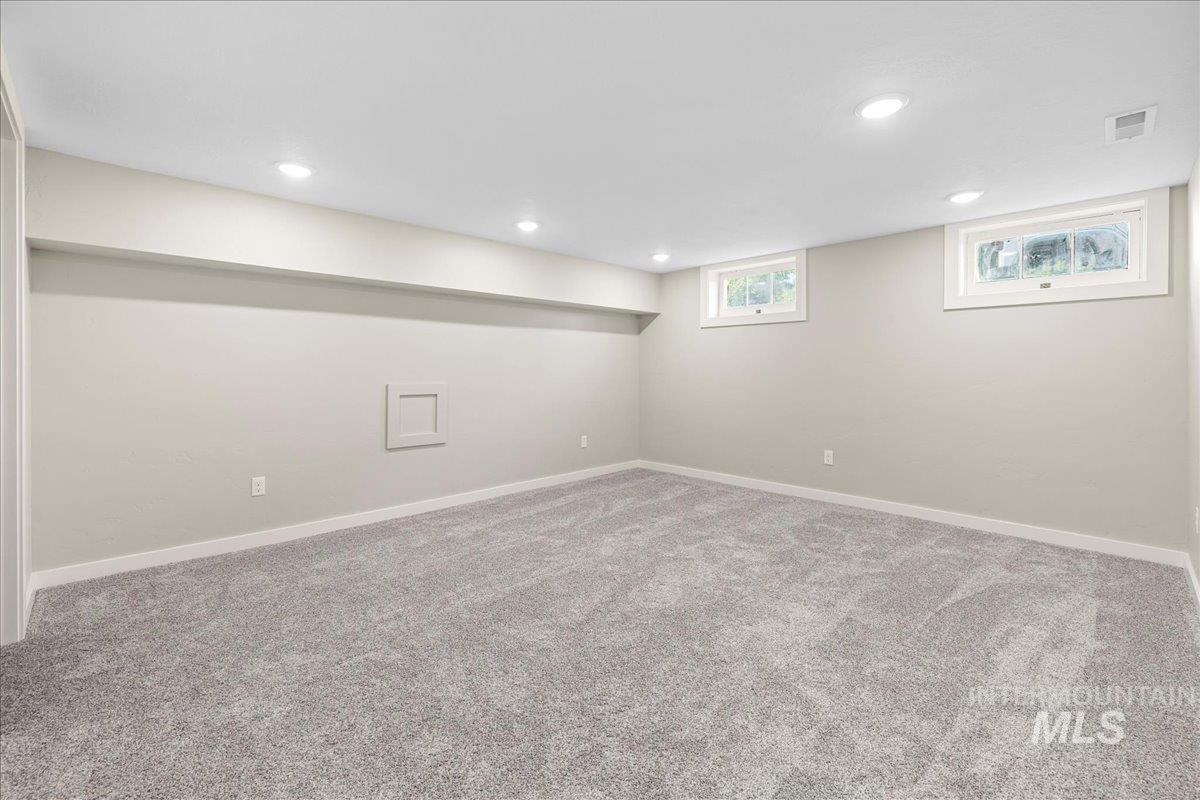 914 West 3rd Street Weiser, ID 83672 - Photo 30 of 49 Below grade area with carpet floors and recessed lighting
