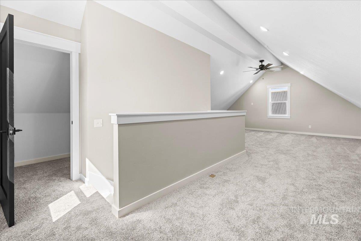 914 West 3rd Street Weiser, ID 83672 - Photo 40 of 49 Bonus room with light carpet and vaulted ceiling