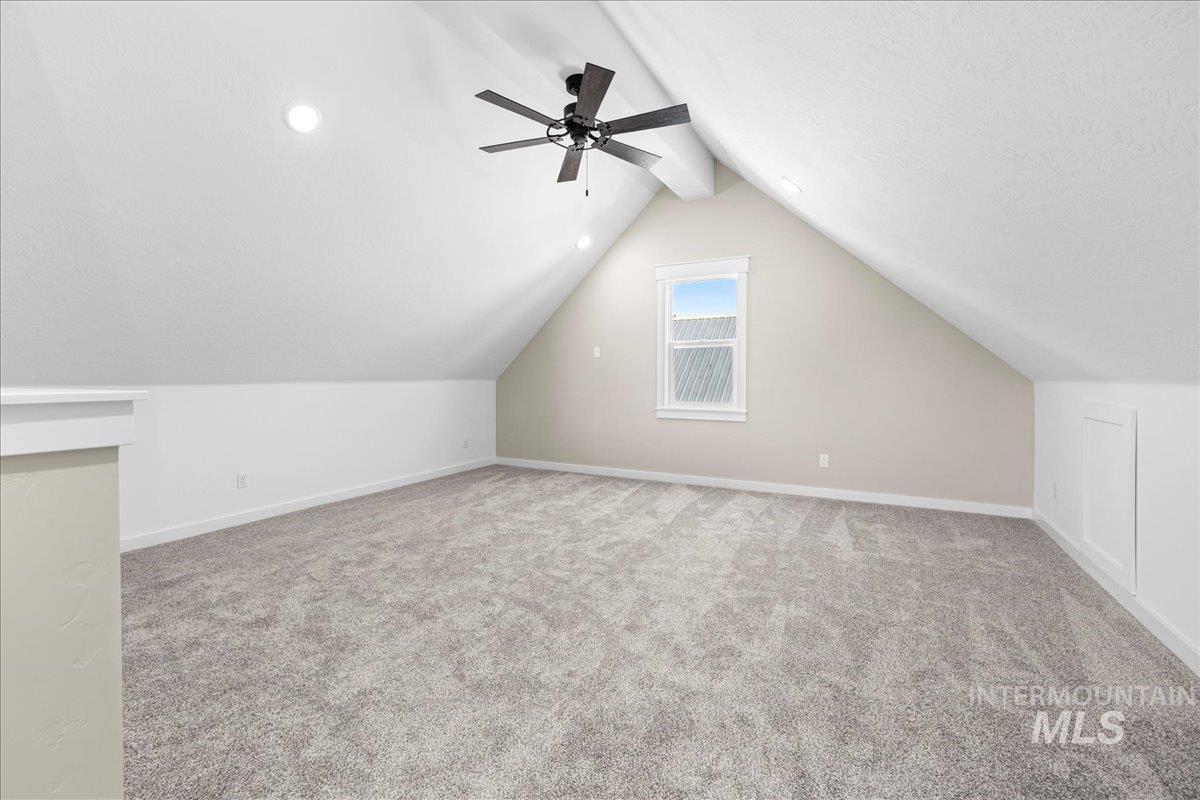 914 West 3rd Street Weiser, ID 83672 - Photo 41 of 49 Bonus room featuring light carpet and a ceiling fan