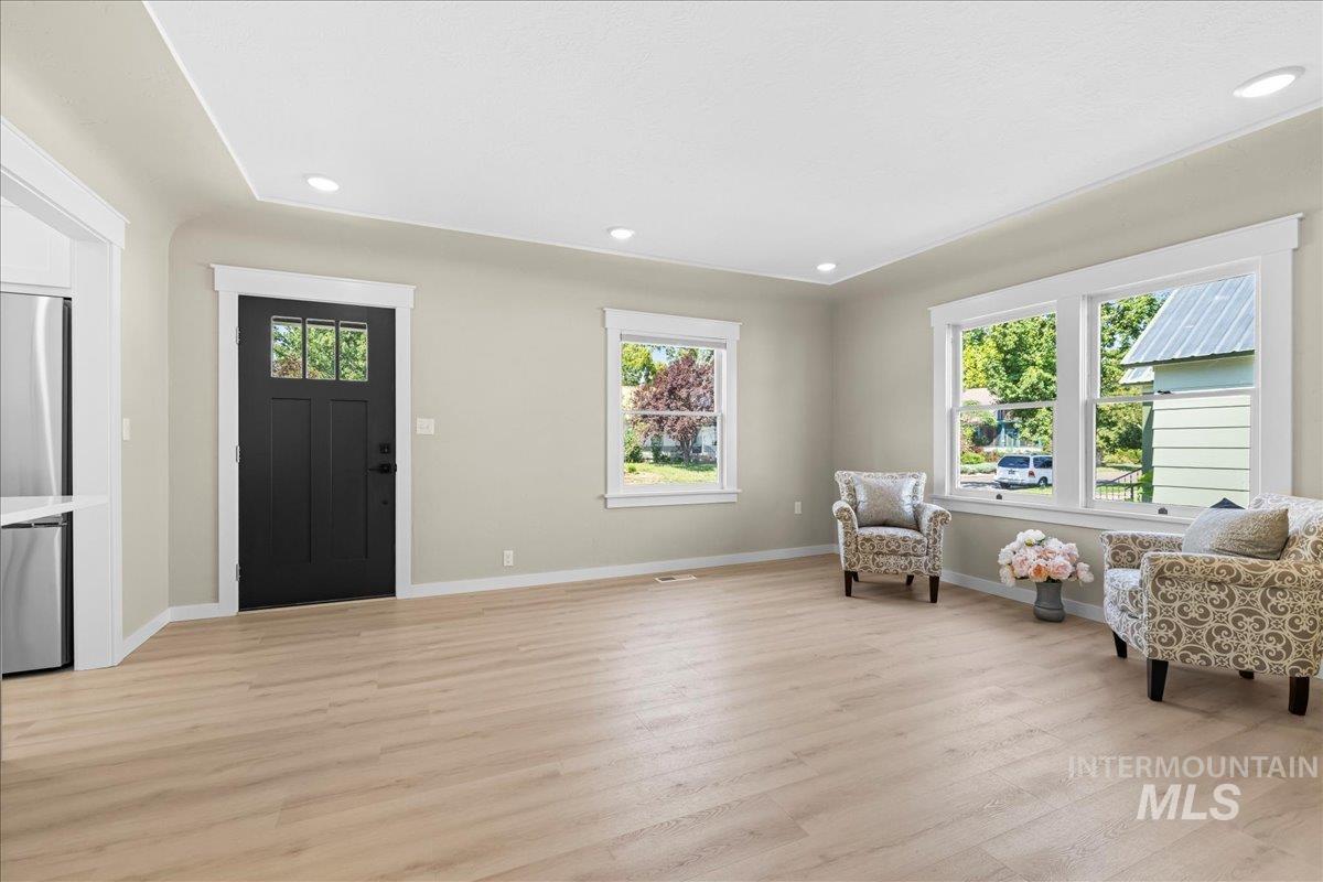914 West 3rd Street Weiser, ID 83672 - Photo 10 of 49 Entryway with light wood-style flooring and recessed lighting