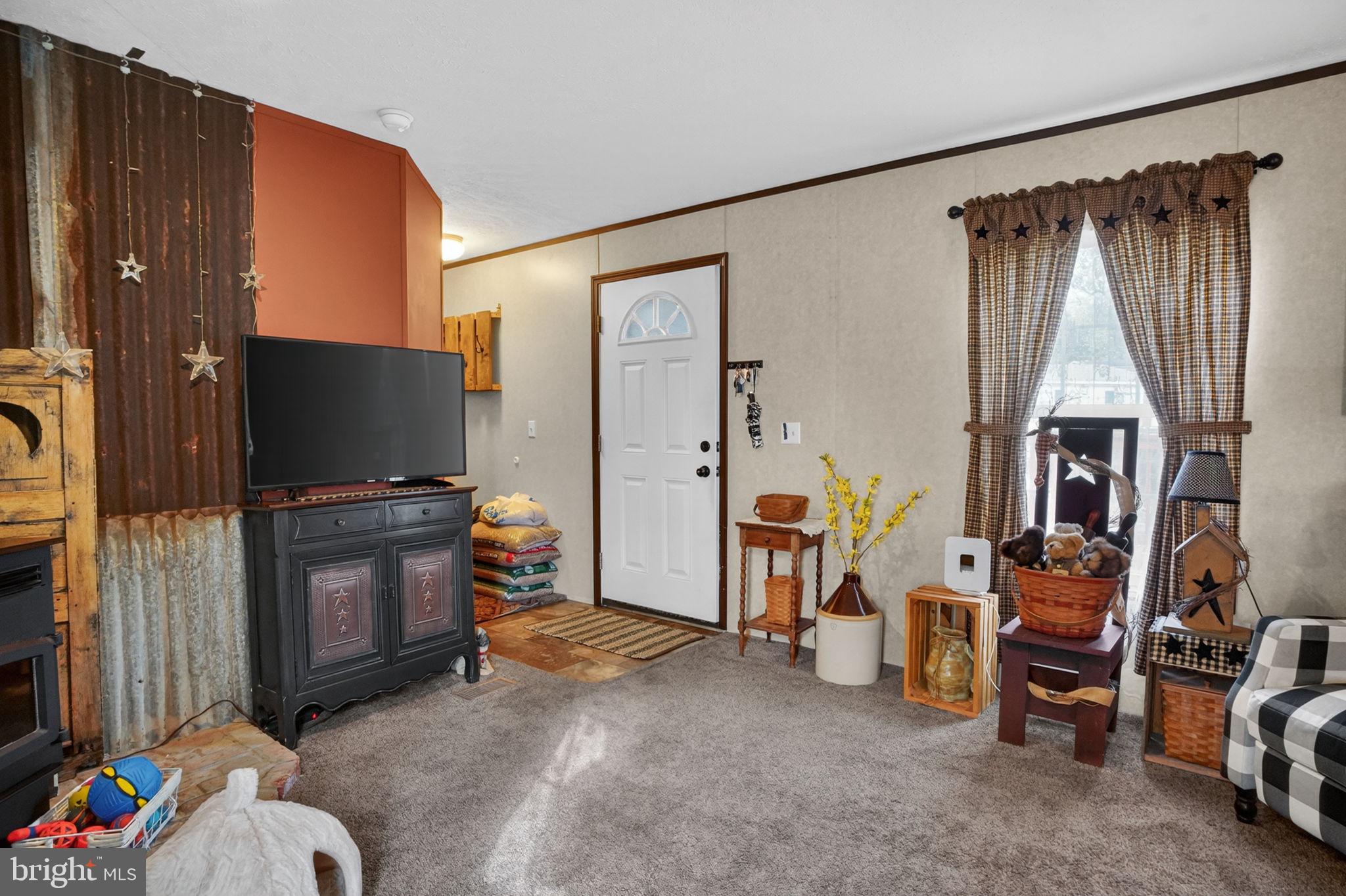 39 Country Club Road West Northampton, PA 18067 - Photo 3 of 26 a living room with furniture and a flat screen tv