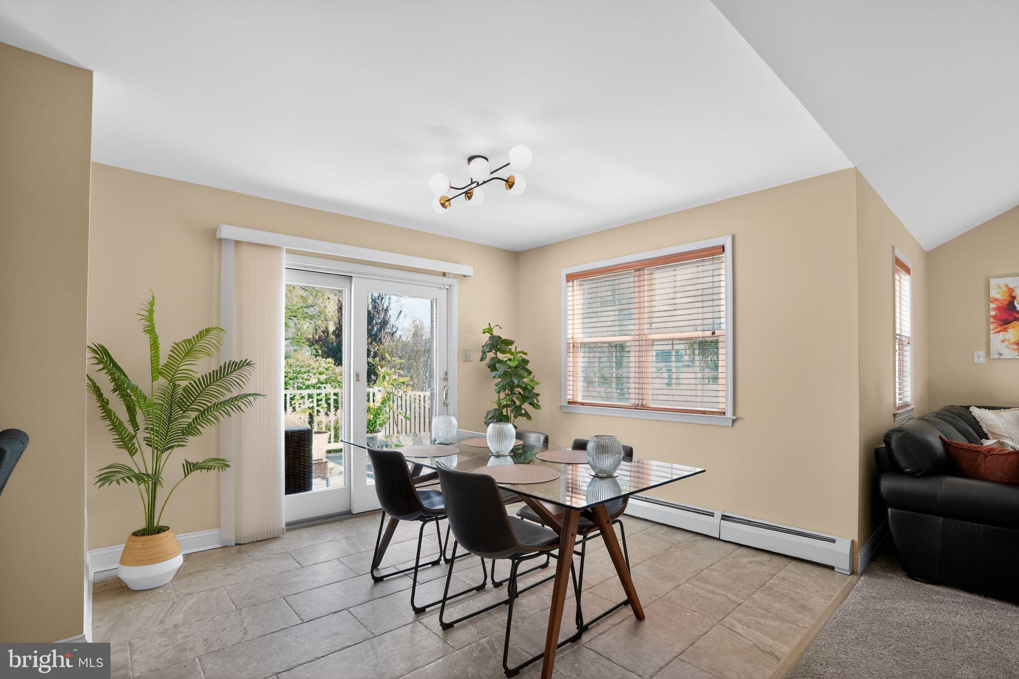 962 Edwards Drive Springfield, PA 19064 - Photo 11 of 32 a view of a dining room with furniture window and outside view
