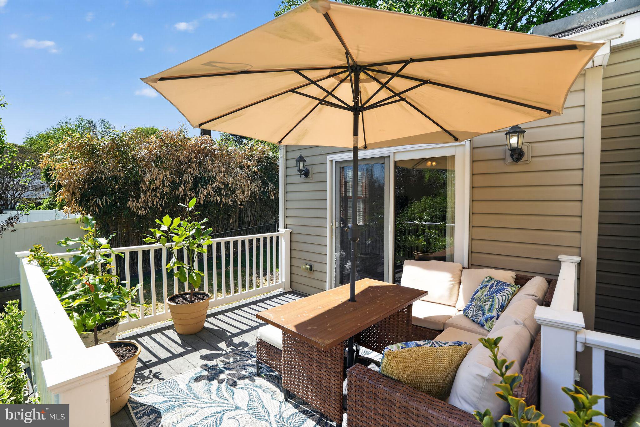 962 Edwards Drive Springfield, PA 19064 - Photo 28 of 32 a outdoor living space with furniture and umbrella