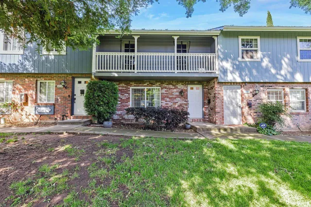 a house view with a garden space