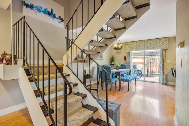 a bedroom with a bed and flat screen tv