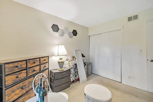 a bed room with a bed and a couch