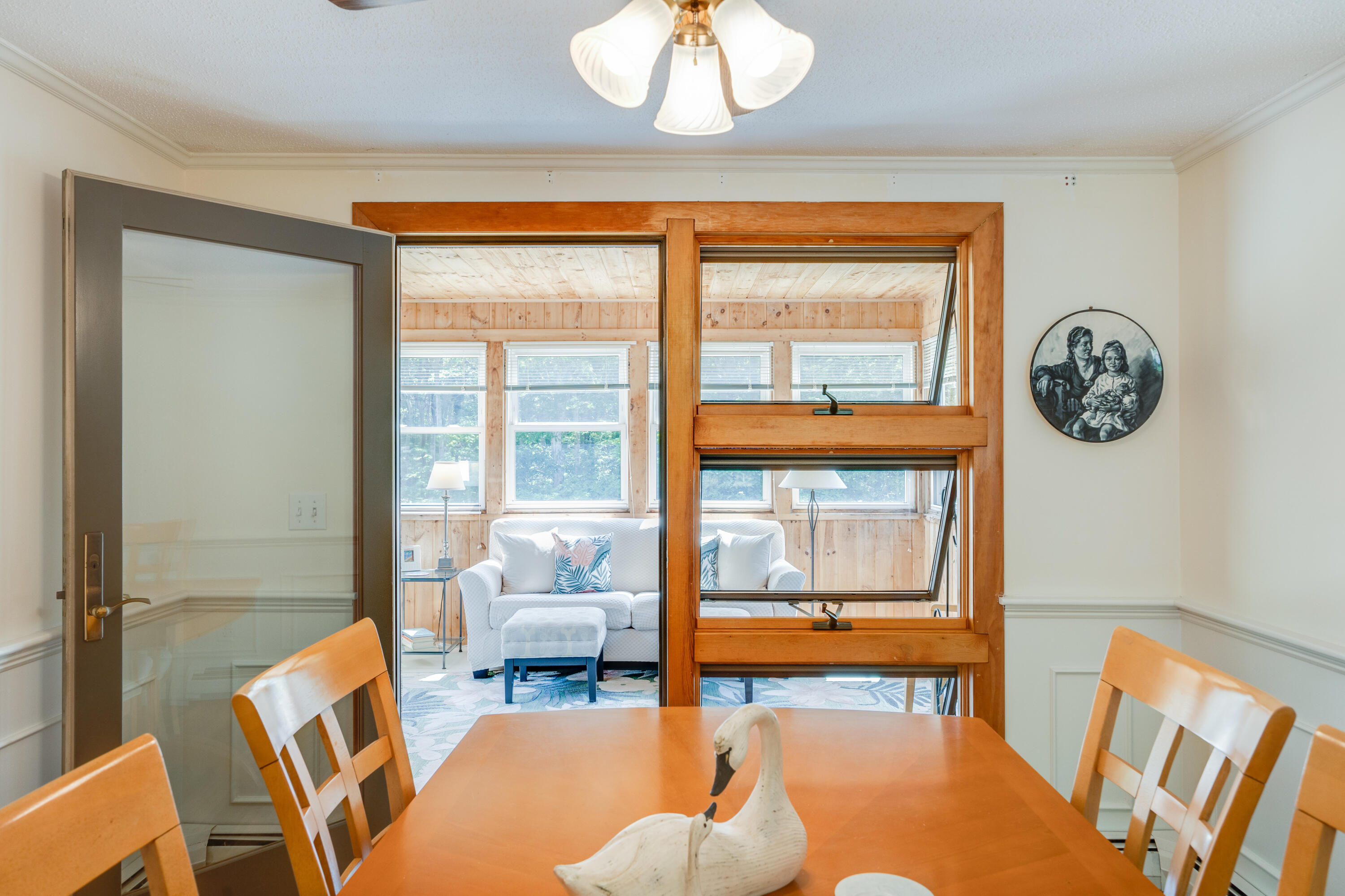 240 Braggs Lane Barnstable, MA 02630 - Photo 11 of 54 a living room filled with furniture and a large window