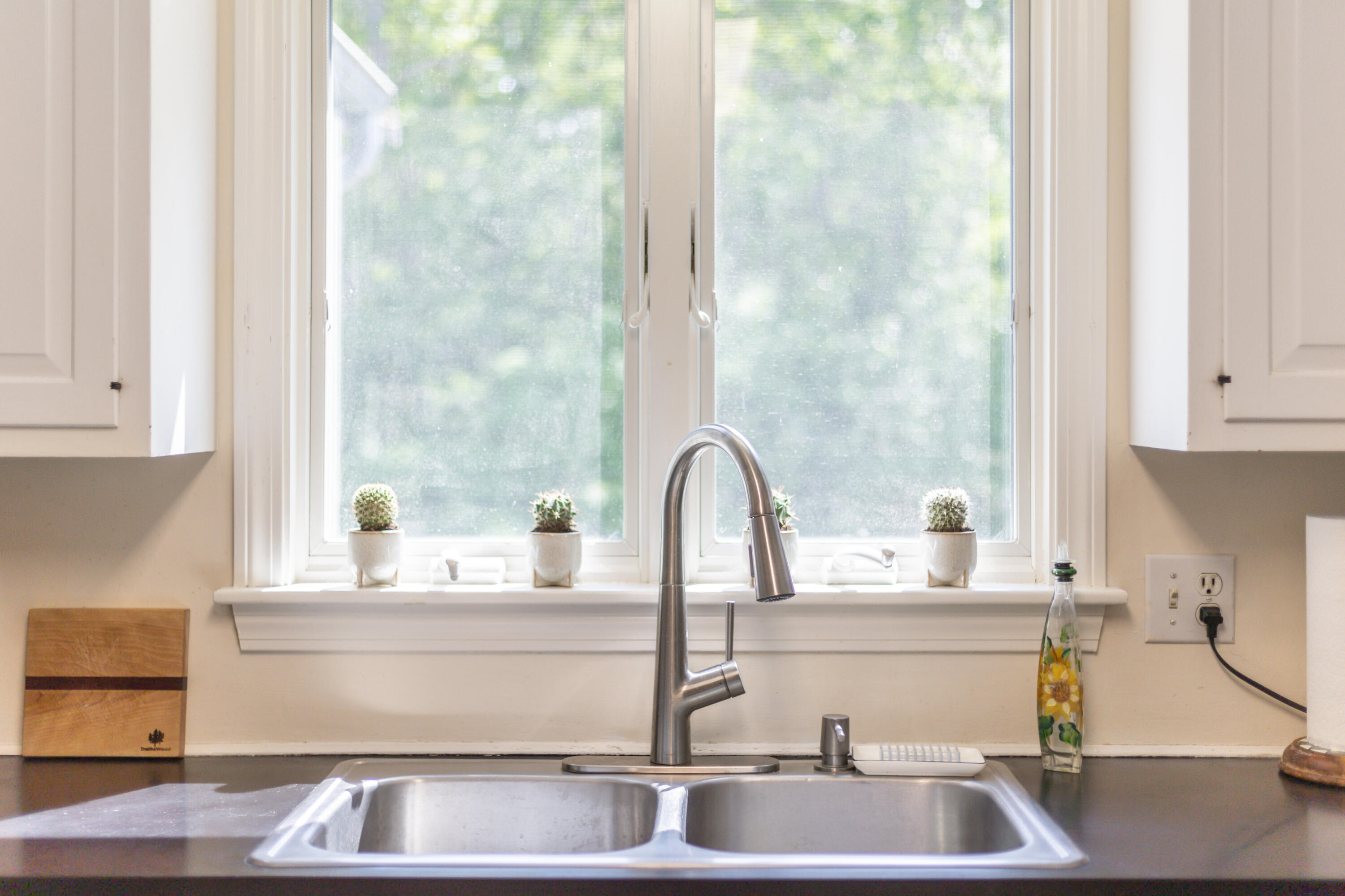 240 Braggs Lane Barnstable, MA 02630 - Photo 18 of 54 a kitchen with a sink and a microwave