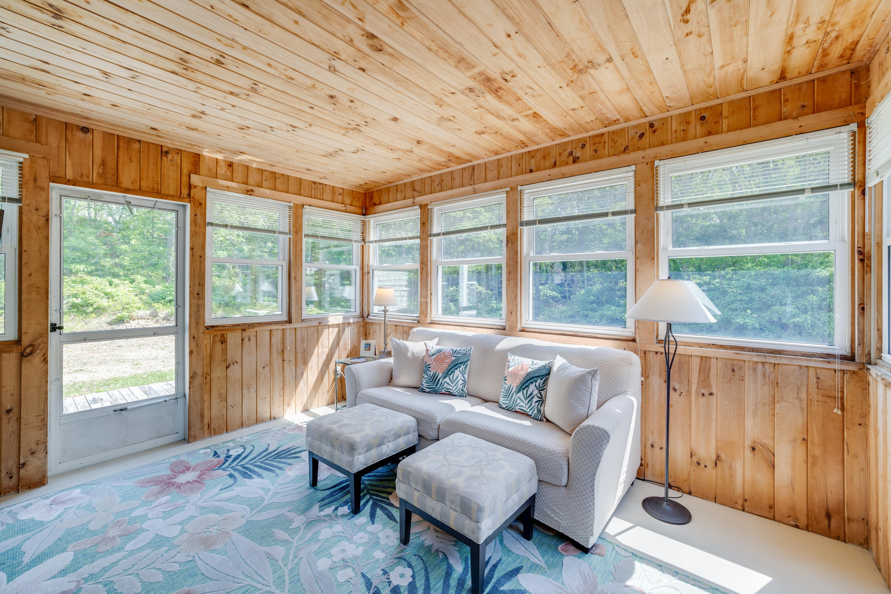 240 Braggs Lane Barnstable, MA 02630 - Photo 21 of 54 a living room with furniture and a large window