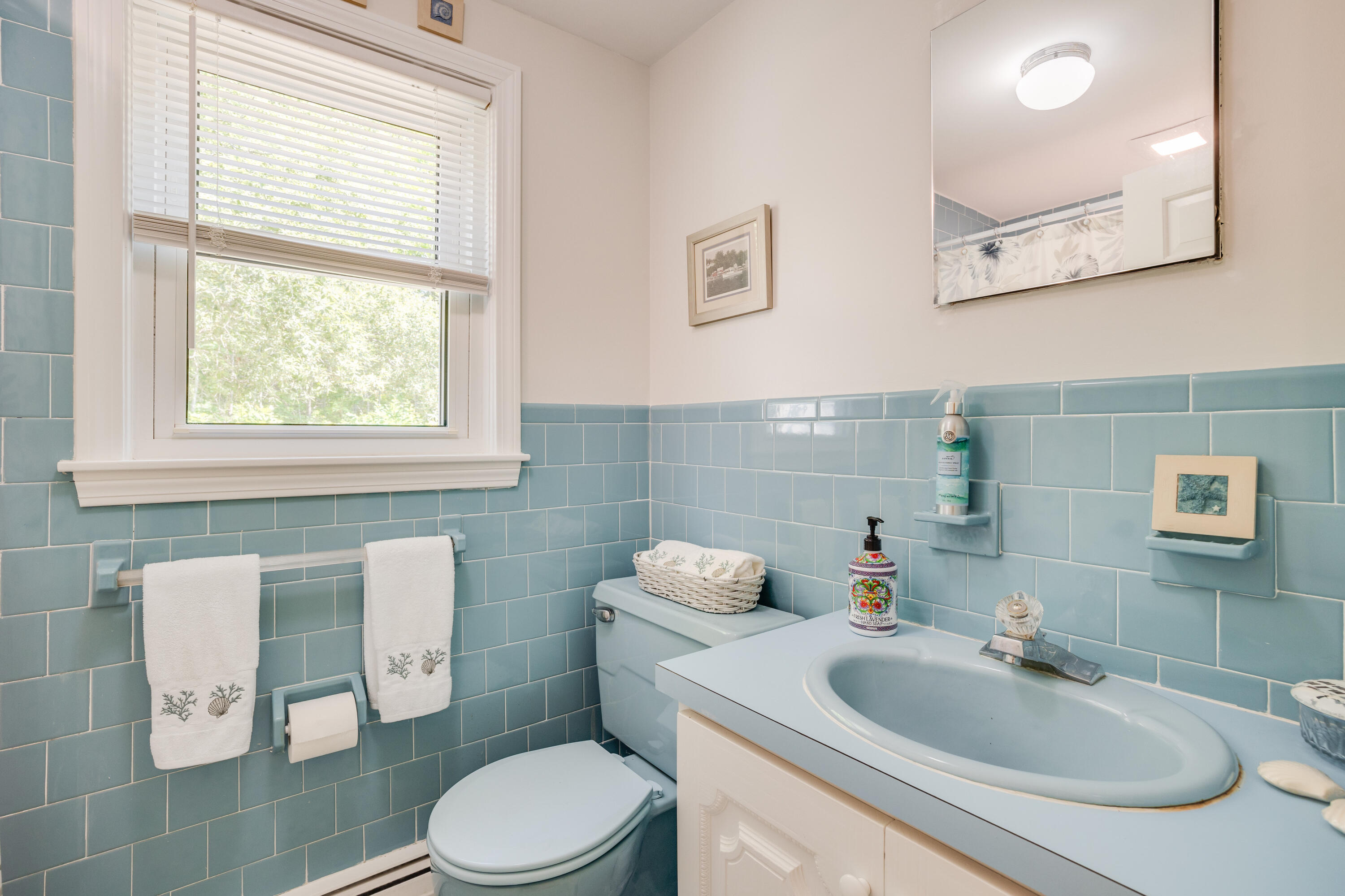 240 Braggs Lane Barnstable, MA 02630 - Photo 31 of 54 a bathroom with a sink toilet a mirror and shower