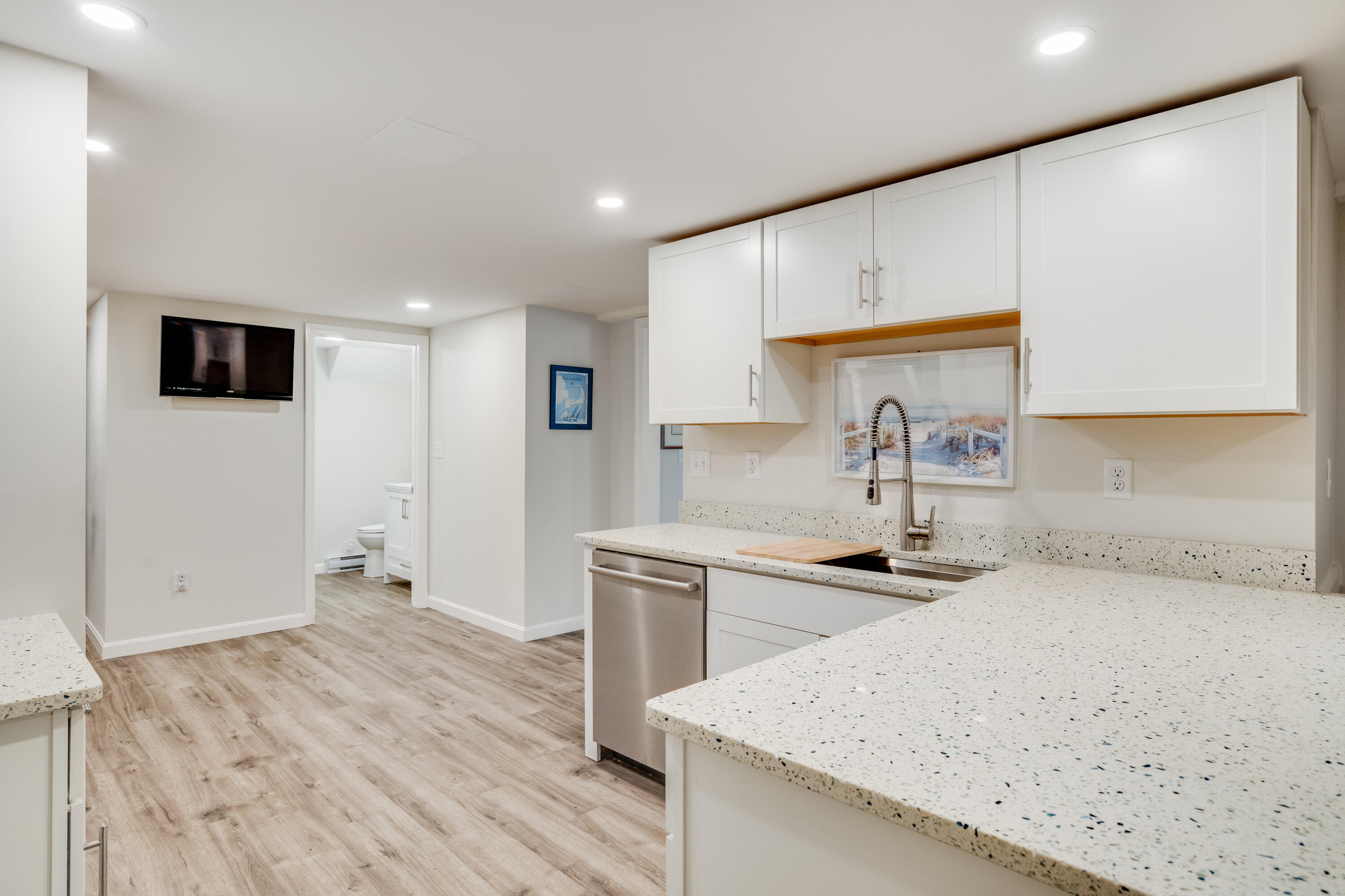 240 Braggs Lane Barnstable, MA 02630 - Photo 37 of 54 a kitchen with a sink stove and refrigerator