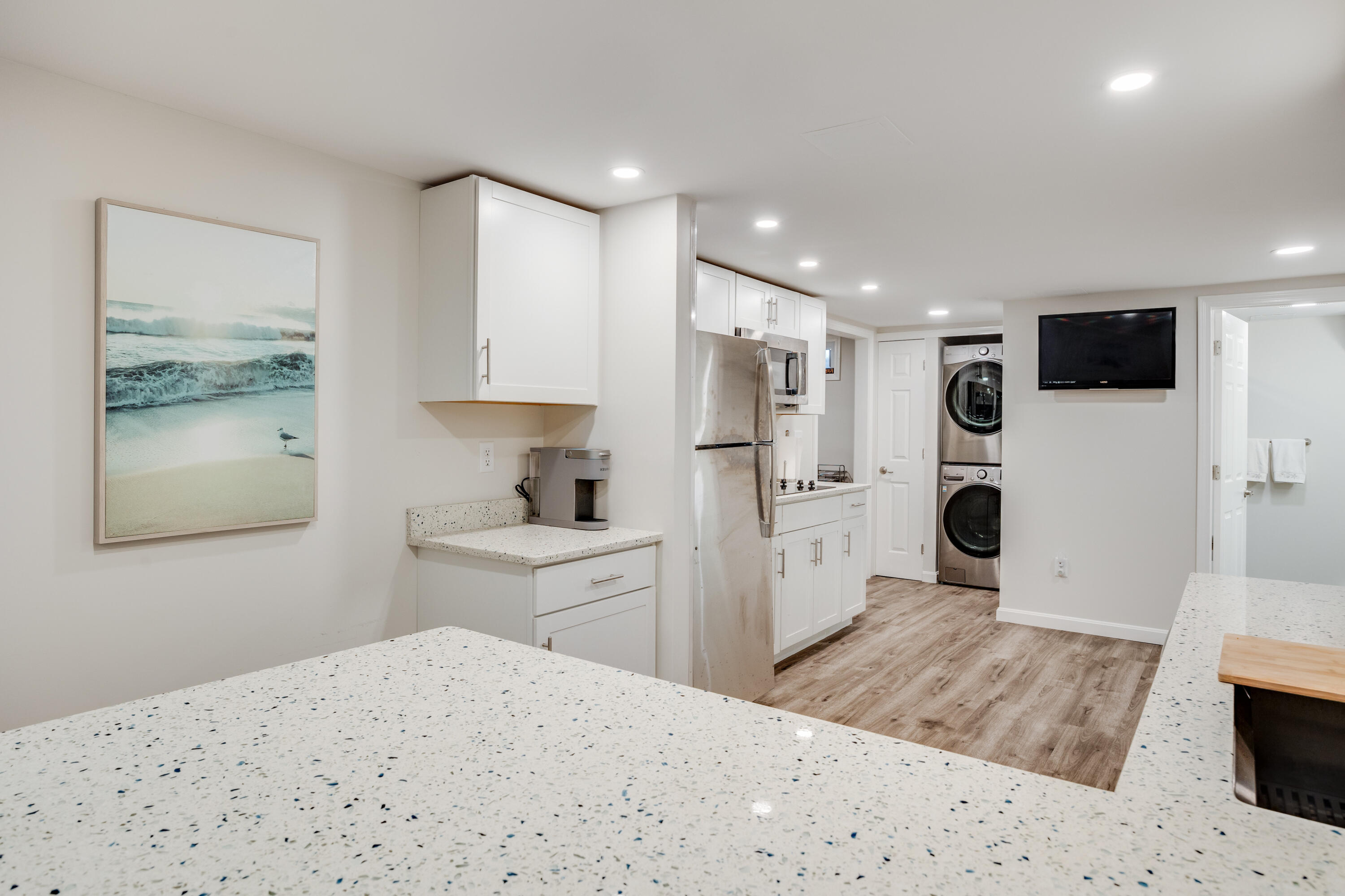 240 Braggs Lane Barnstable, MA 02630 - Photo 38 of 54 a kitchen with a refrigerator and a stove top oven