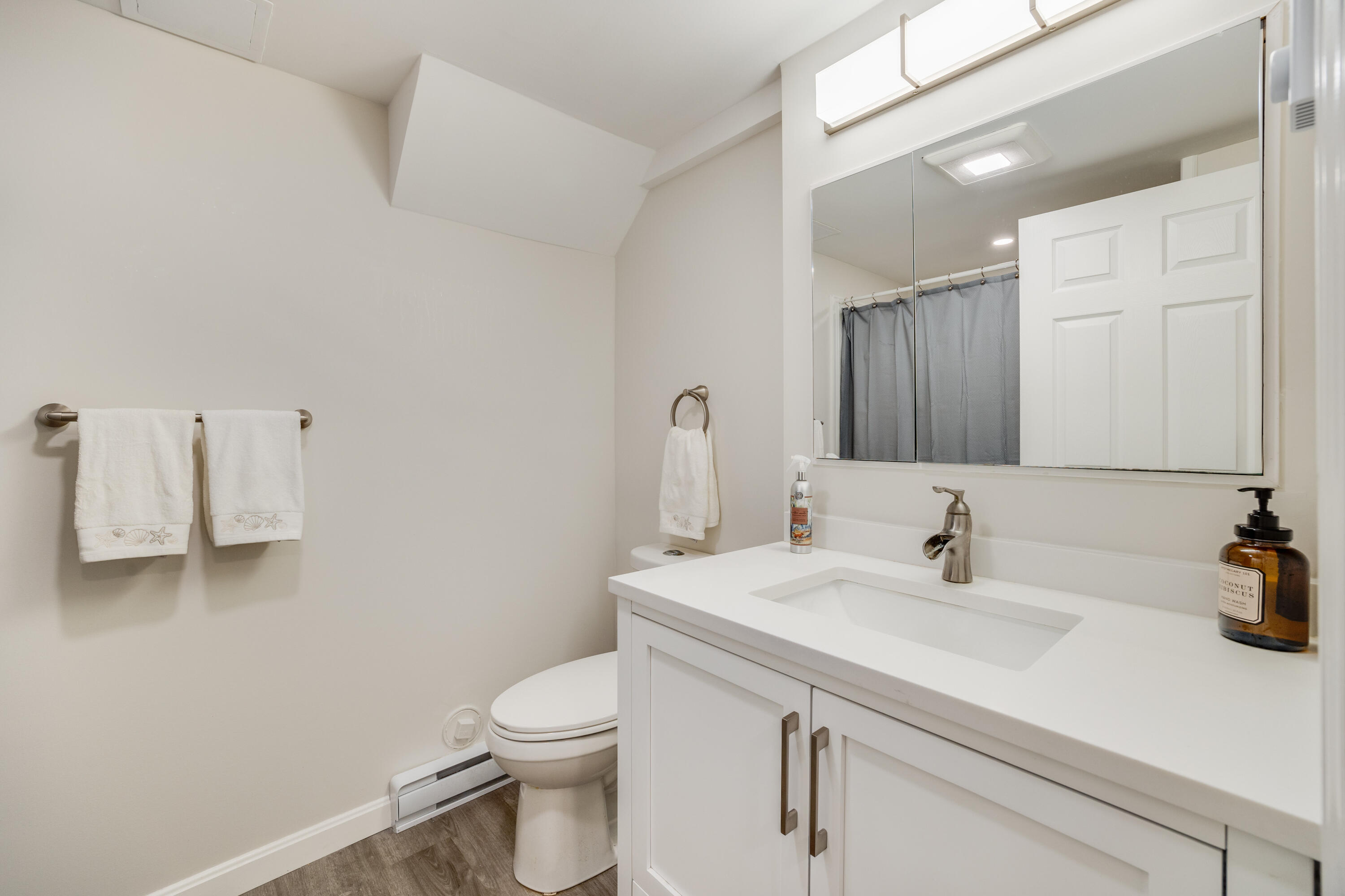 240 Braggs Lane Barnstable, MA 02630 - Photo 44 of 54 a bathroom with a sink toilet and mirror