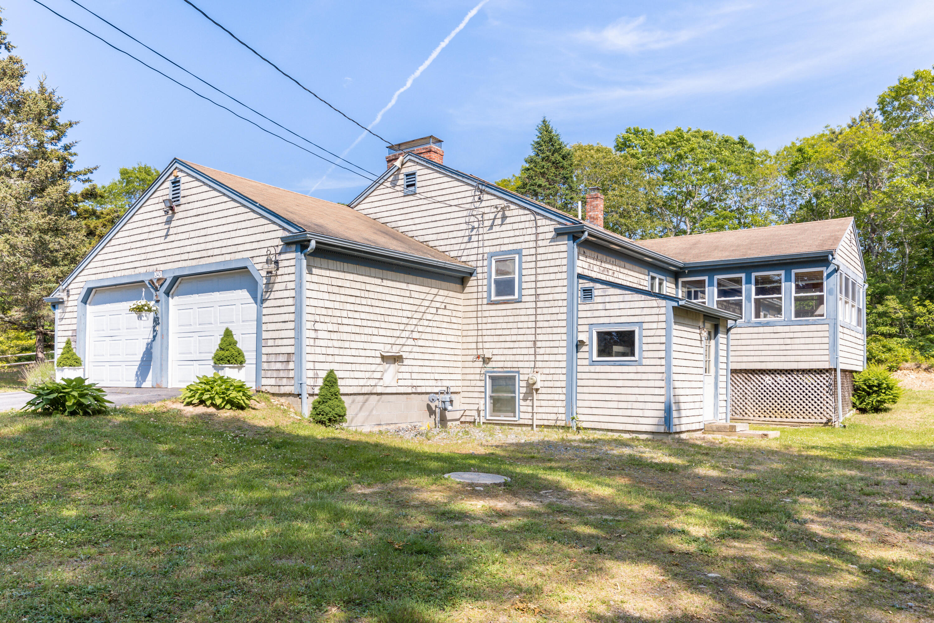 240 Braggs Lane Barnstable, MA 02630 - Photo 49 of 54 a view of a house with a yard