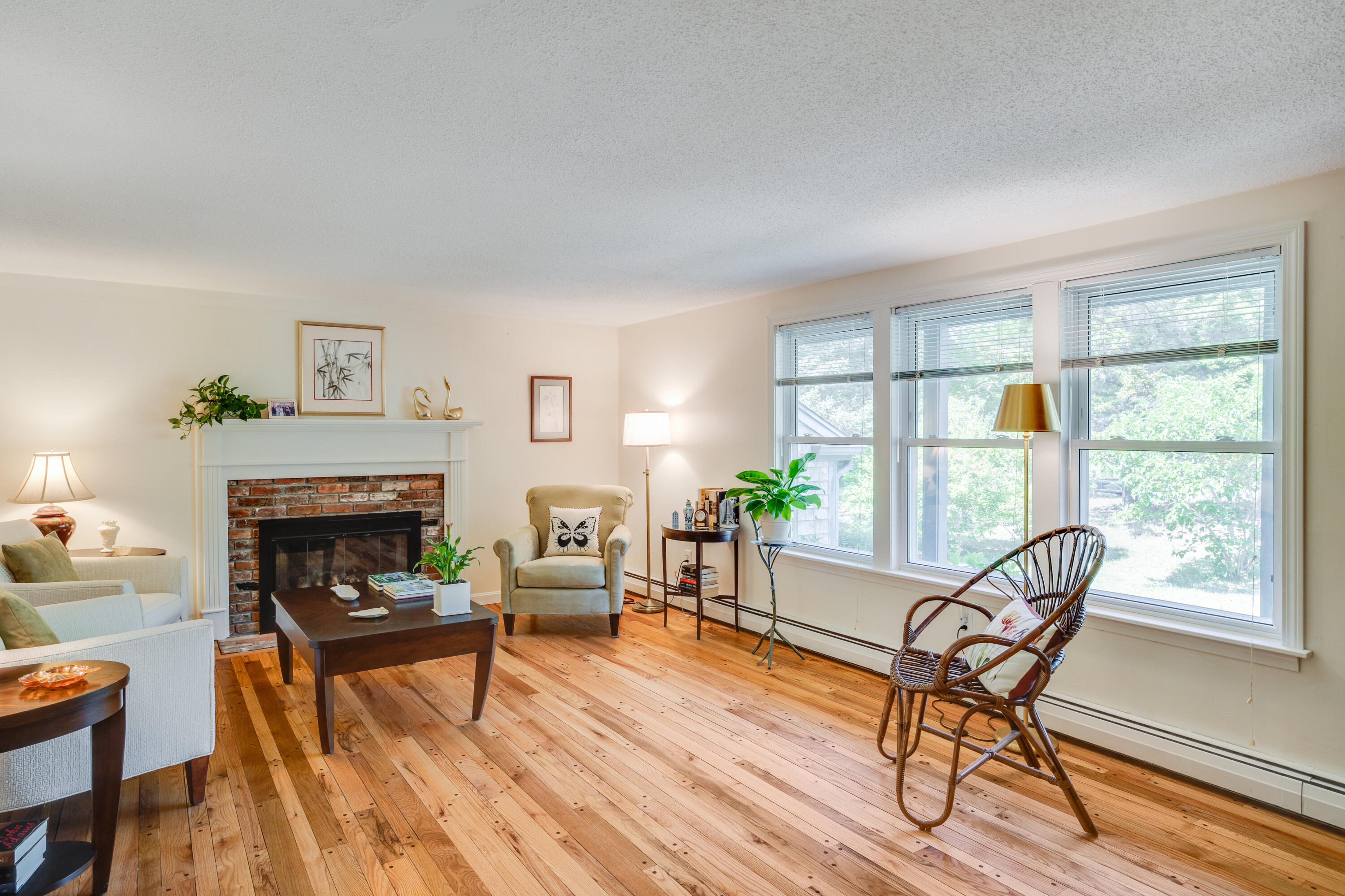 240 Braggs Lane Barnstable, MA 02630 - Photo 5 of 54 a living room with furniture and a fireplace