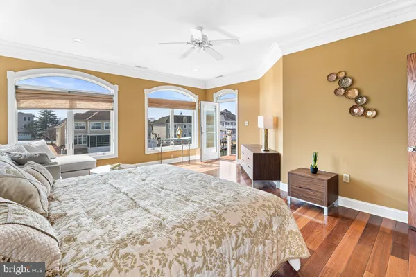 a living room with furniture gym equipment and view of living room