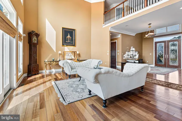 a white stove top oven sitting inside of a kitchen